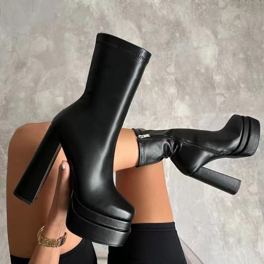 Vue arrière des bottines Summit Luxe™ mettant en valeur la hauteur.