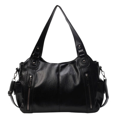 Vue détaillée du sac bandoulière femme Vintage Luxe™ avec compartiments